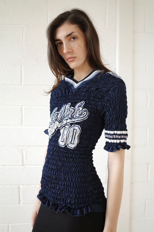 The Reconstituted Shirred US Football Top