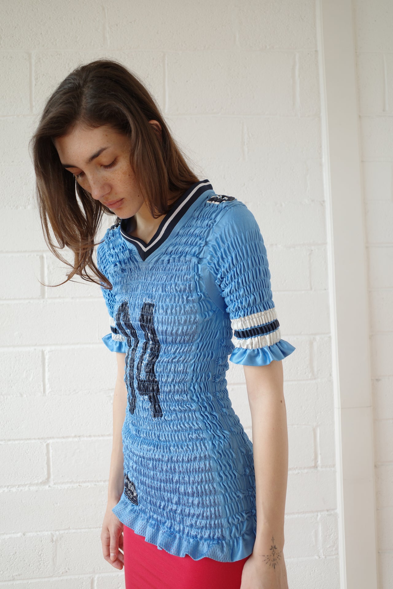 The Reconstituted Shirred US Football Top