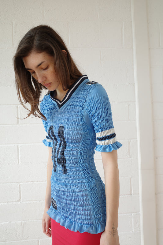 The Reconstituted Shirred US Football Top
