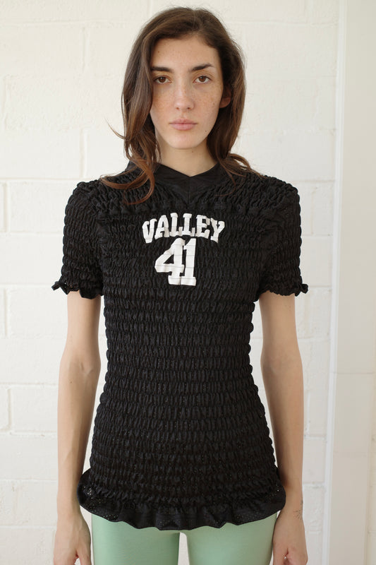 The Reconstituted Shirred US Football Top
