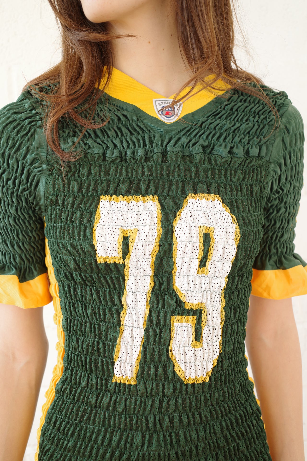 The Reconstituted Shirred US Football Top