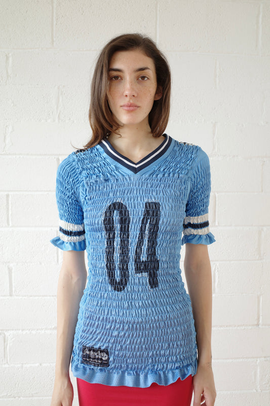 The Reconstituted Shirred US Football Top
