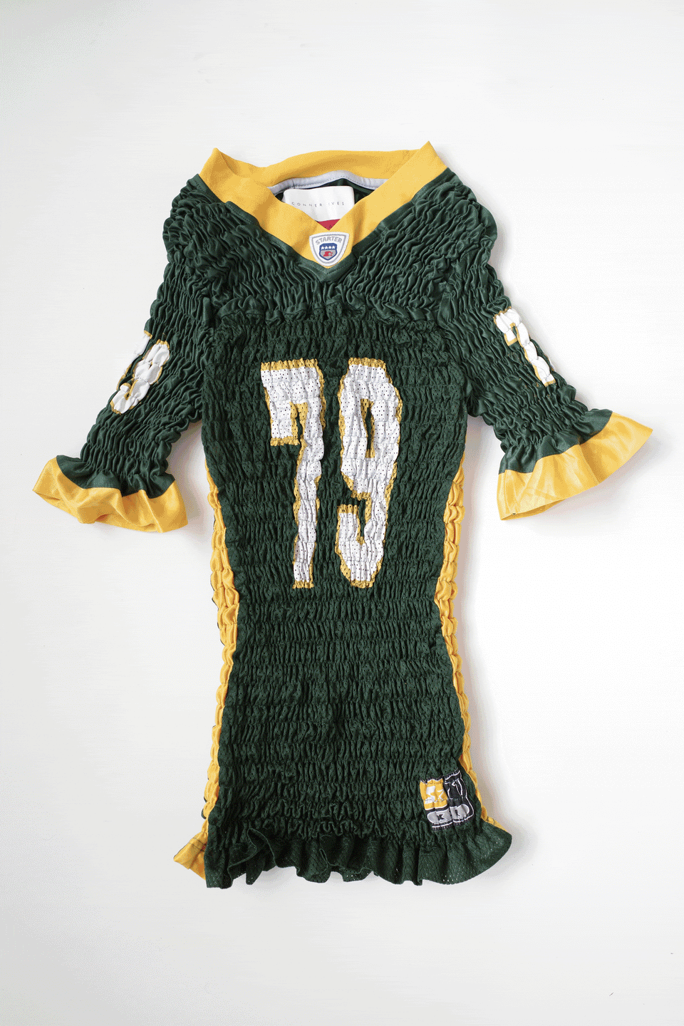 The Reconstituted Shirred US Football Top